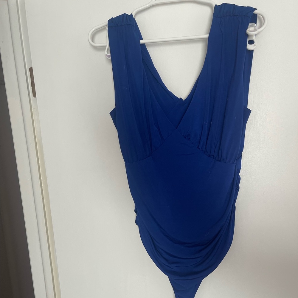 Express blue body contour body suit. L